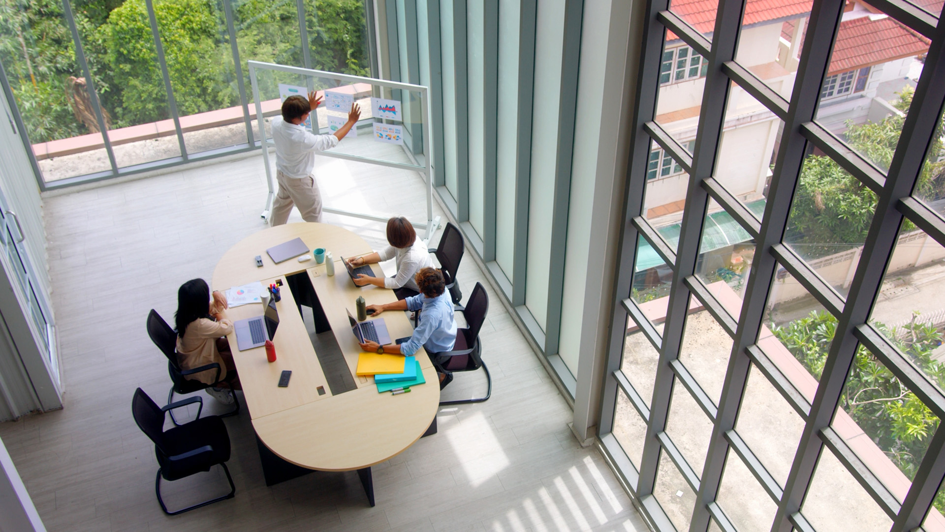 A group of professionals collaborating in an office setting